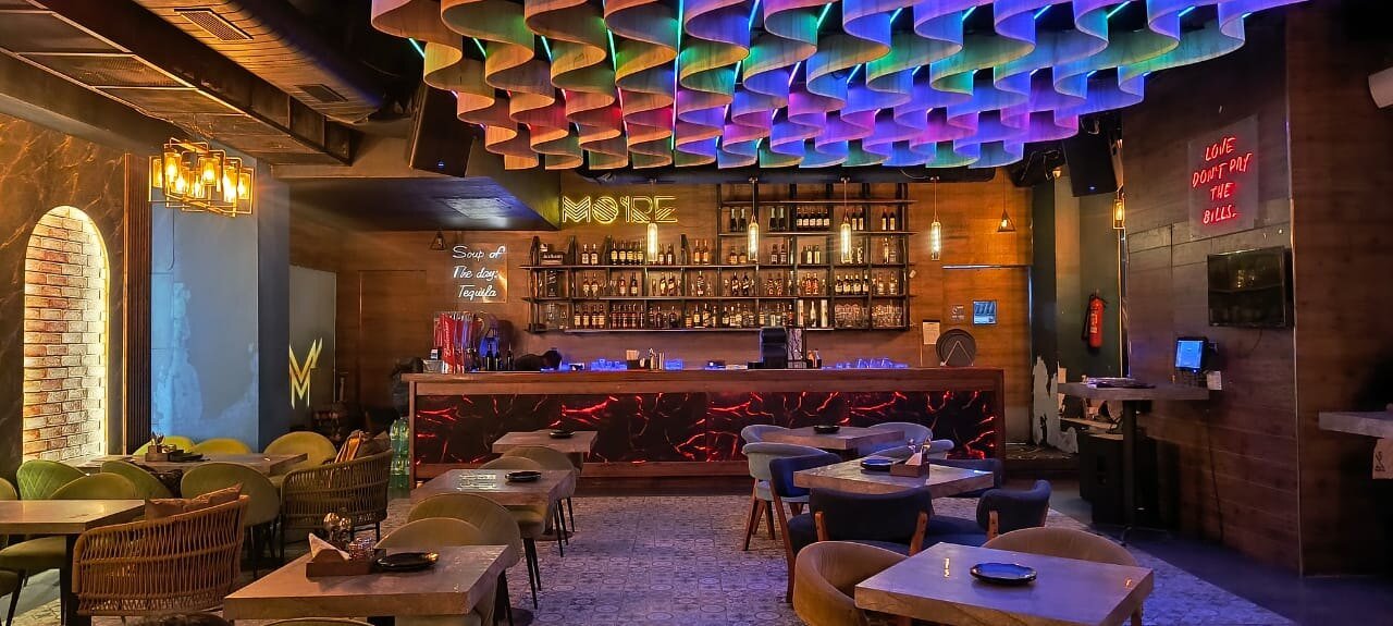 Moire lounge bar with illuminated ceiling